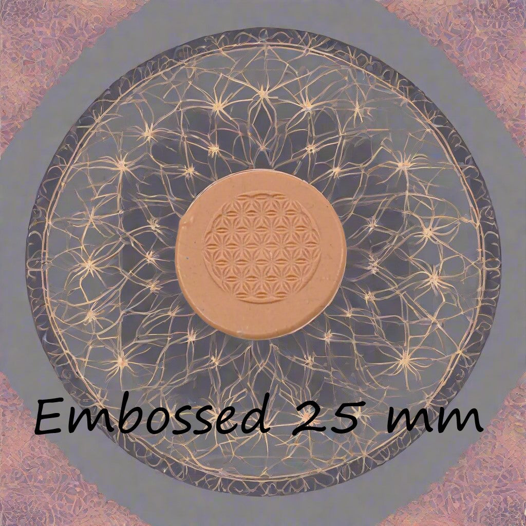 25 mm Flower of Life design debossed in silly putty Using an embossed texture mat. This will give you an idea of what it will look like on metal clay or polymer clay