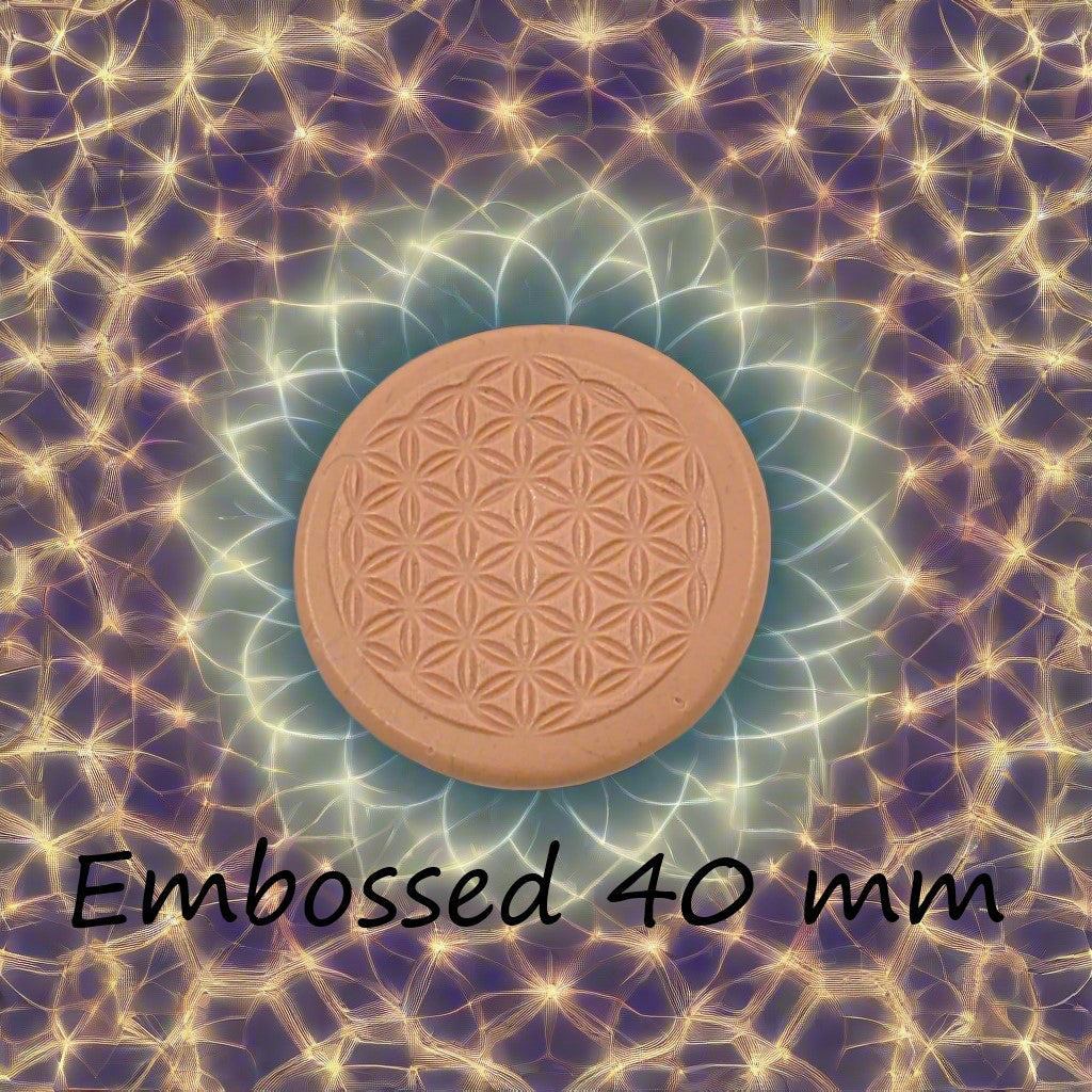 40 mm Flower of Life design debossed in silly putty Using an embossed texture mat. This will give you an idea of what it will look like on metal clay or polymer clay