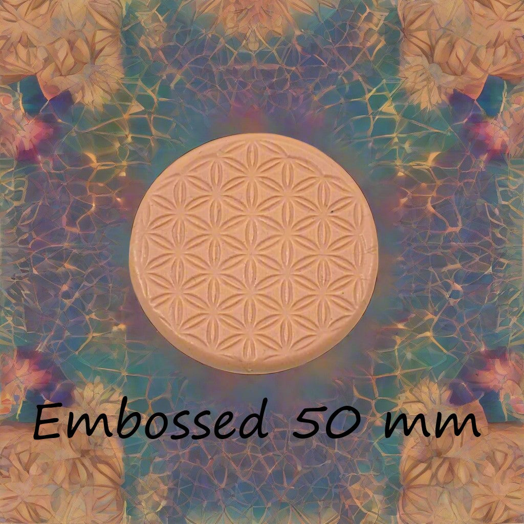50 mm Flower of Life design debossed in silly putty Using an embossed texture mat. This will give you an idea of what it will look like on metal clay or polymer clay