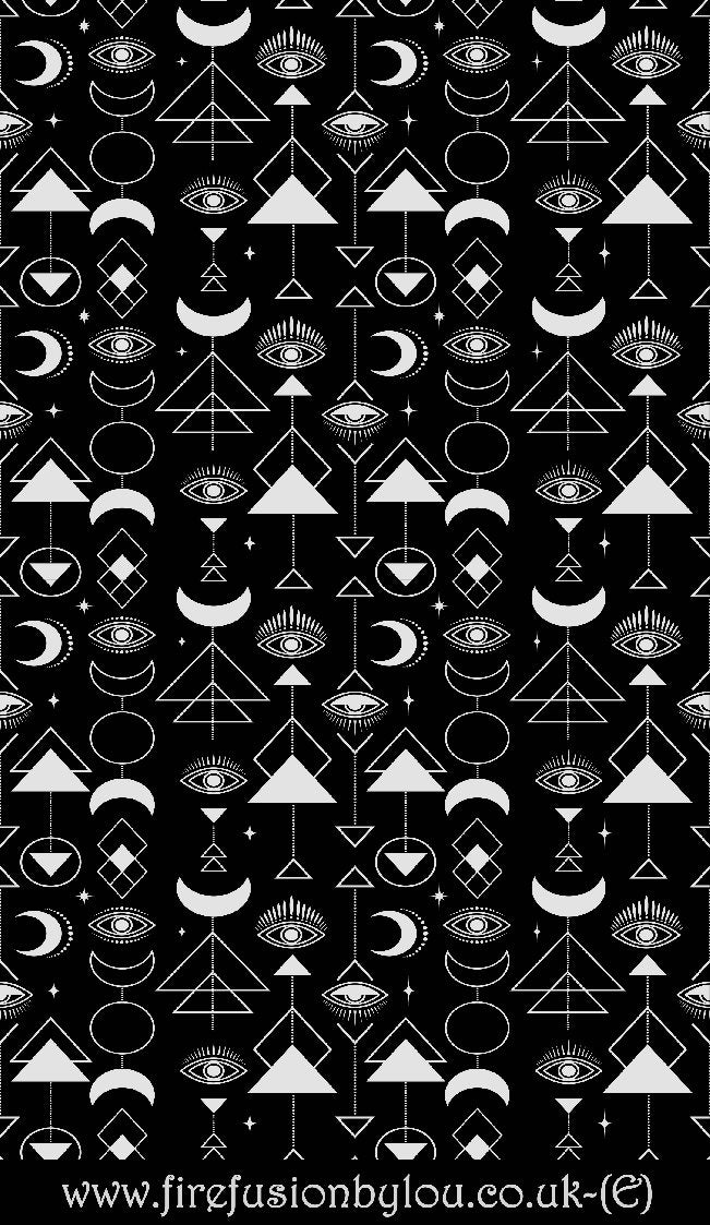 Small abstract eye repeat pattern debossed texture mat. This picture shows the texture mat pattern in black and white for use on metal clay or polymer clay.