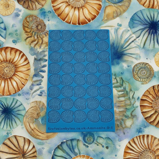 A 95 x 55 mm texture mat with debossed and embossed ammonite in a repeat pattern. Use to make a impression on metal clay and polymer clay.