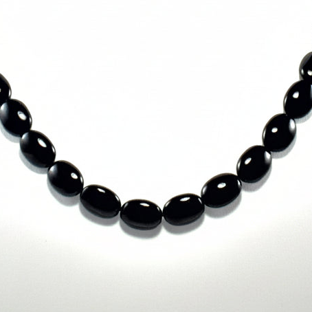 Close up of Black agate Oval Beads