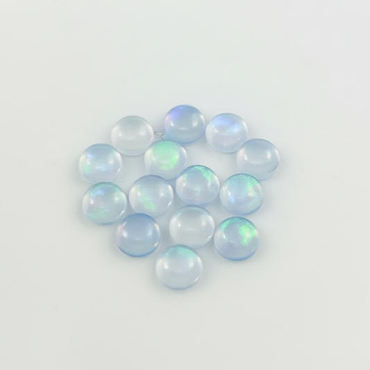 Blue Opal with green fire on a light background