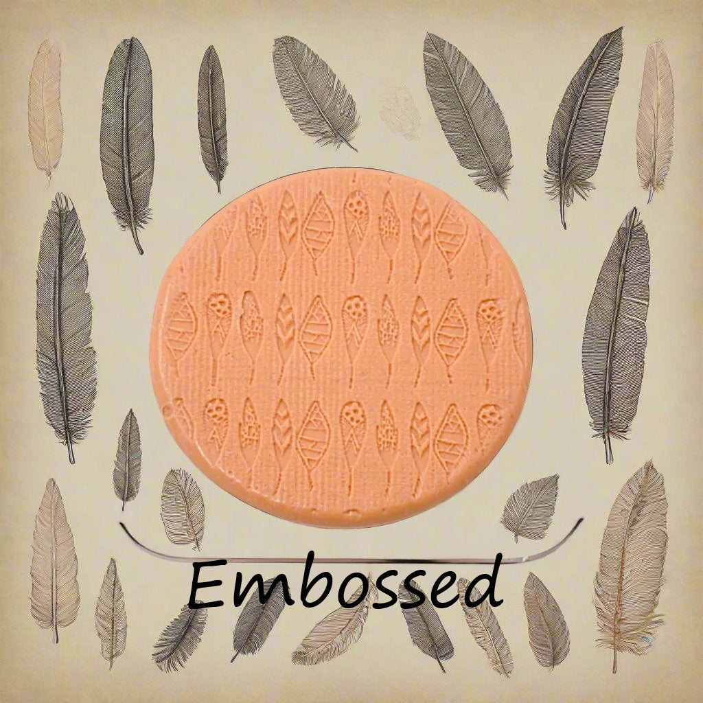 A pattern debossed in silly putty Using a patterned embossed texture mat in grey material. This will give you an idea of what it will look like on metal clay or polymer clay.