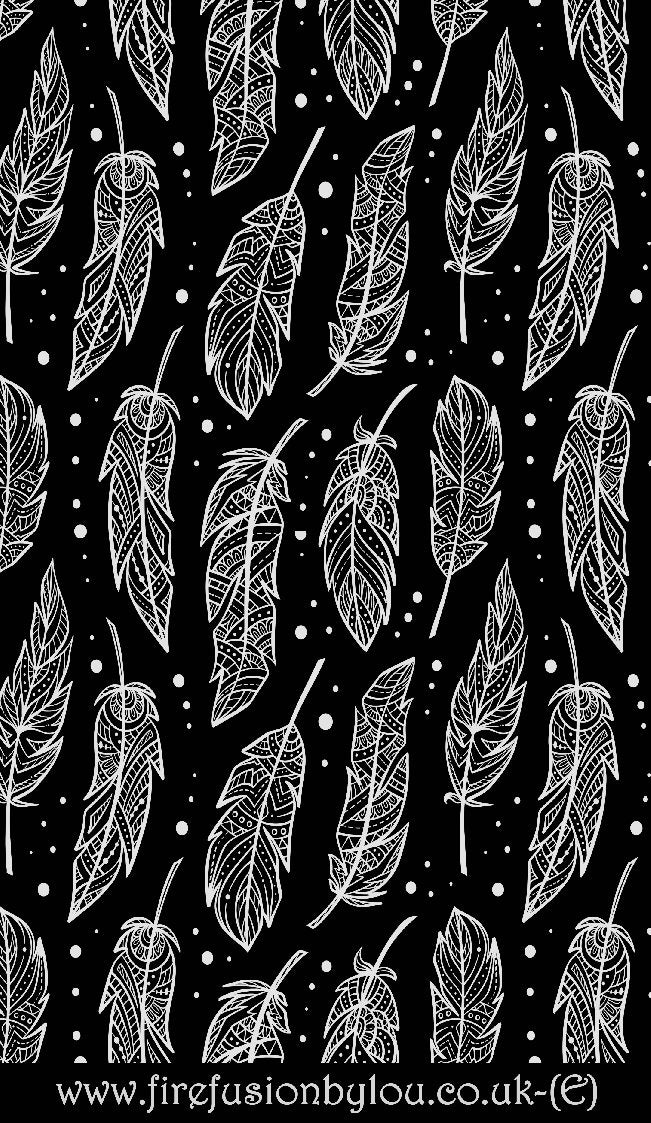 A feather pattern embossed texture mat in grey material. This picture shows the texture mat pattern in black and white for use on metal clay or polymer clay.