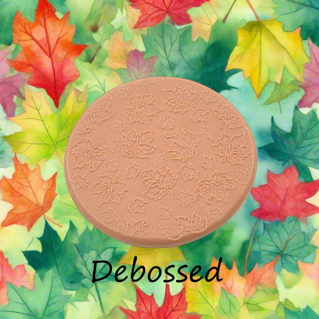Canadian Leaves embossed in silly putty Using a debossed texture mat. This will give you an idea of what it will look like on metal clay or polymer clay