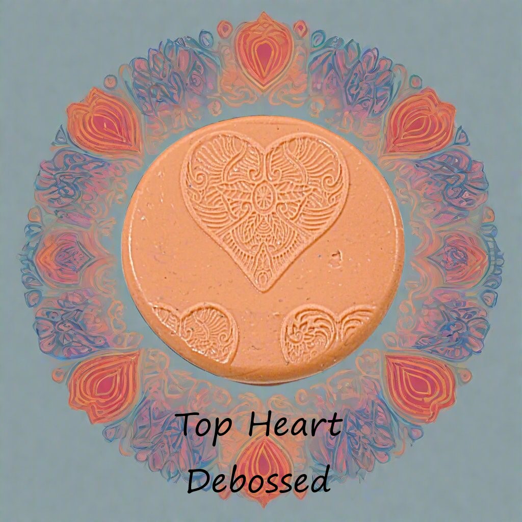 A Celtic pattern embossed in silly putty Using a debossed texture mat in grey material. This will give you an idea of what it will look like on metal clay or polymer clay.