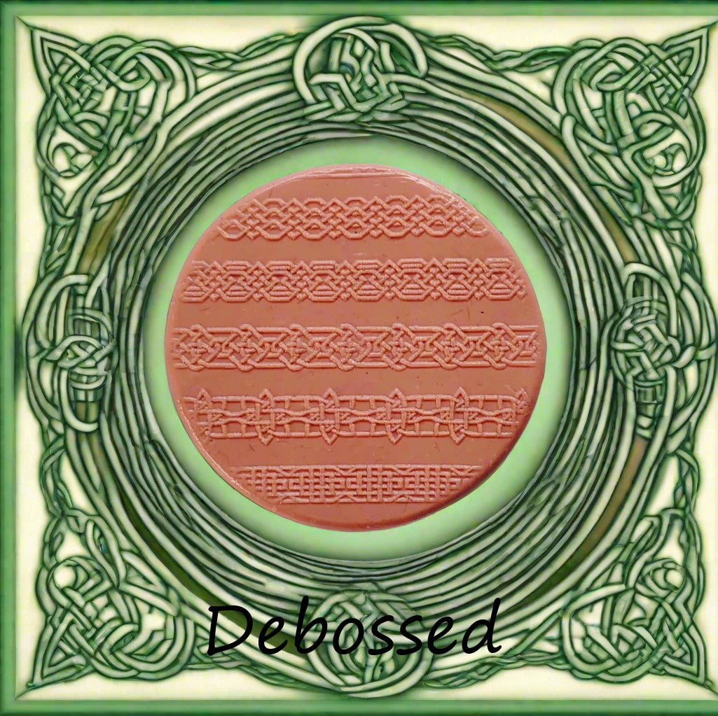 Celtic patterns embossed in silly putty Using a debossed texture mat. This will give you an idea of what it will look like on metal clay or polymer clay.