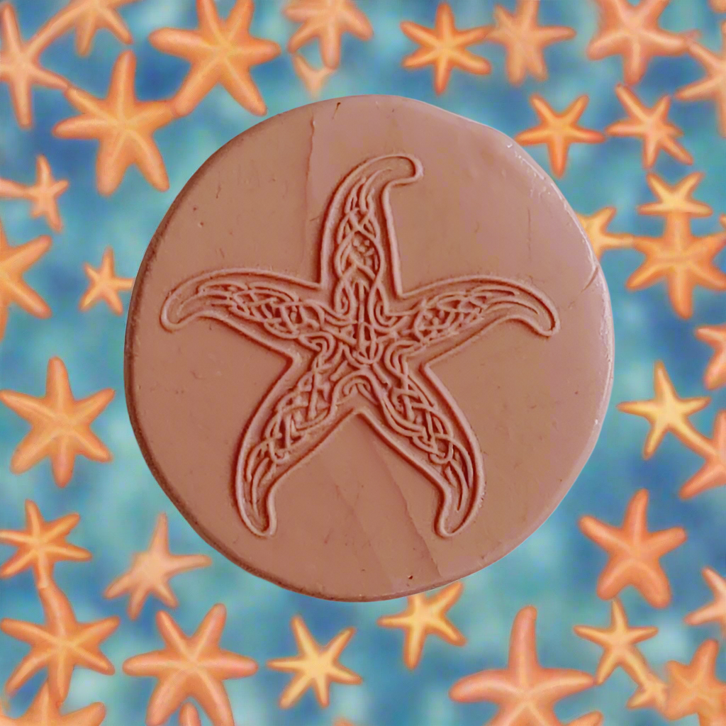 Celtic starfish embossed in silly putty Using a debossed texture mat. This will give you an idea of what it will look like on metal clay or polymer clay.
