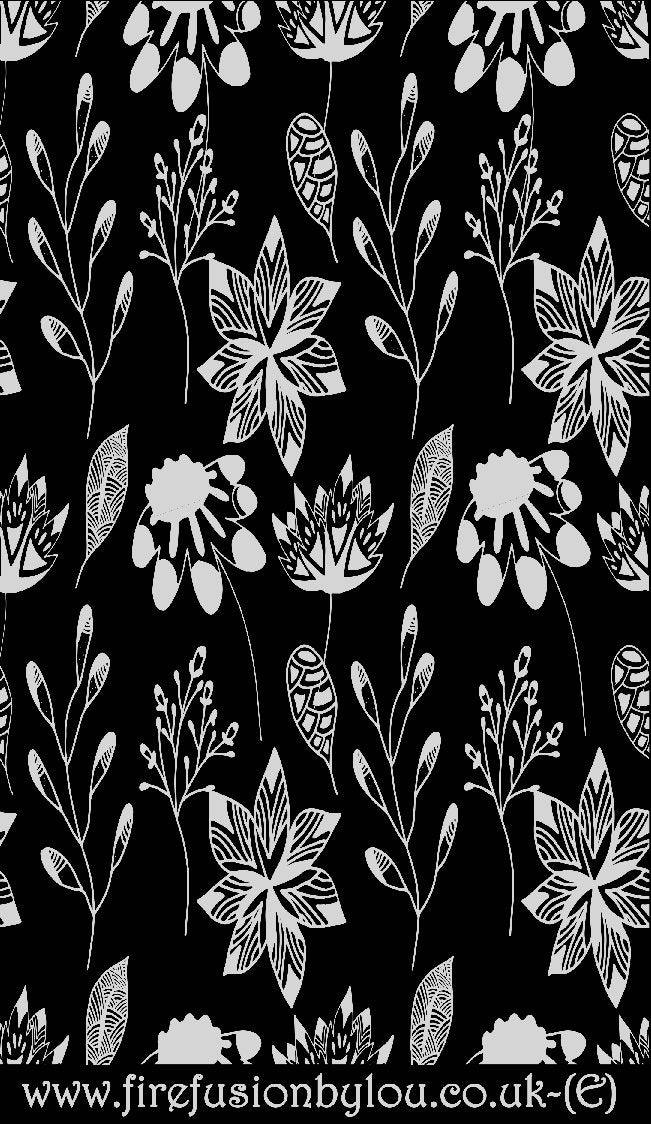 An embossed texture mat of flowers. This picture shows the texture mat pattern in black and white for use on metal clay or polymer clay.