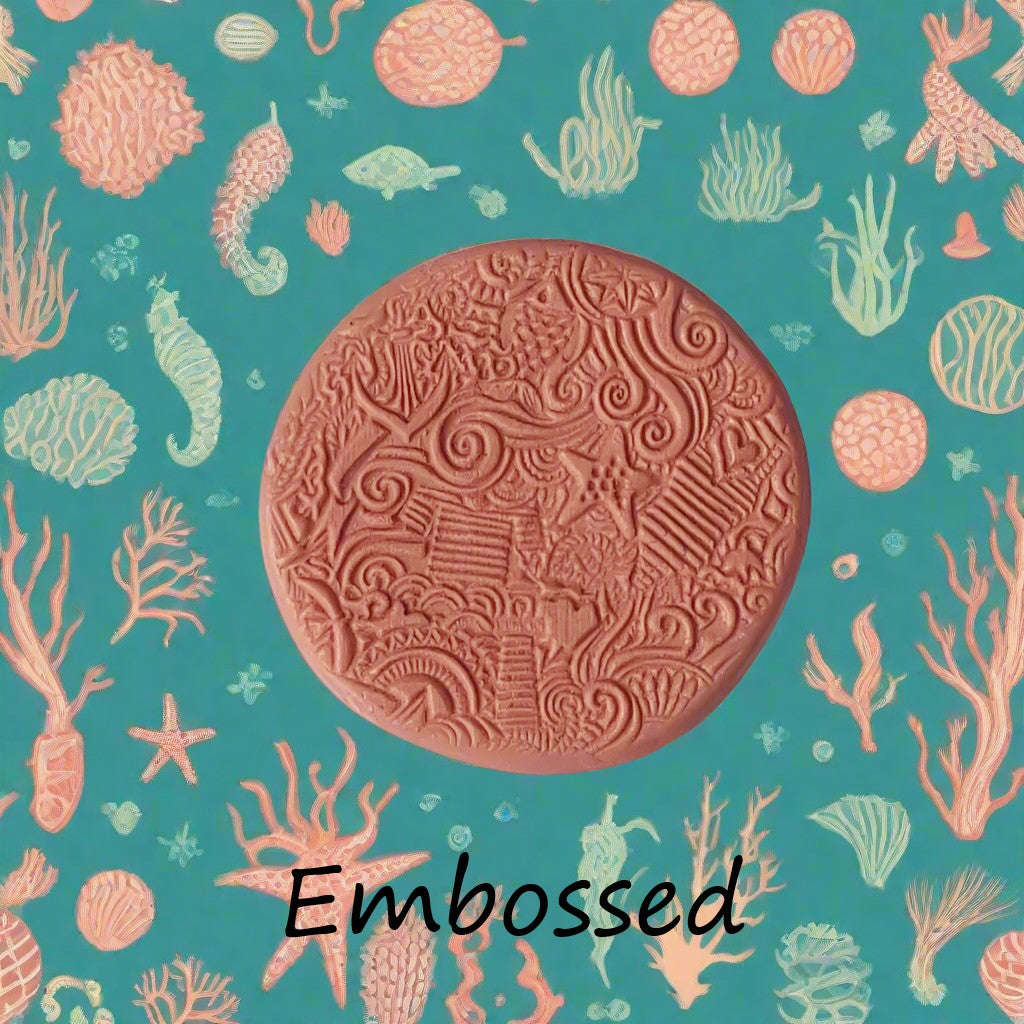 Ocean embossed/debossed in silly putty Using a embossed texture mat. This will give you an idea of what it will look like on metal clay or polymer clay