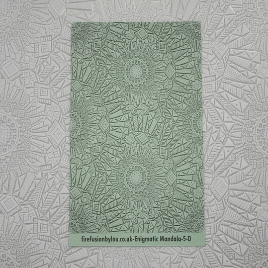 A debossed texture mat with an array of mandala flowery petals. Use to make an impression on metal clay and polymer clay.