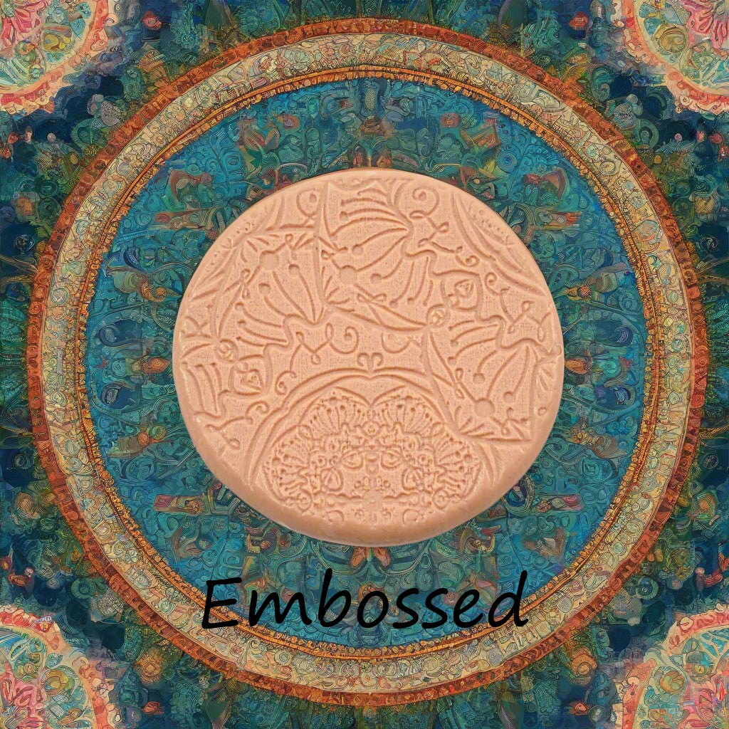 A flower mandala debossed in silly putty Using a embossed texture mat. This will give you an idea of what it will look like on metal clay or polymer clay.