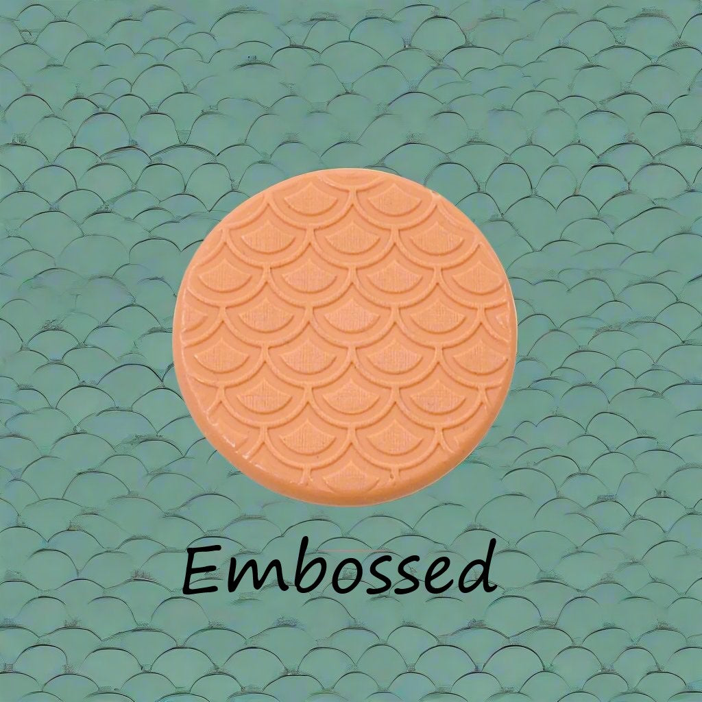 A pattern debossed in silly putty Using a patterned embossed texture mat in grey material. This will give you an idea of what it will look like on metal clay or polymer clay.