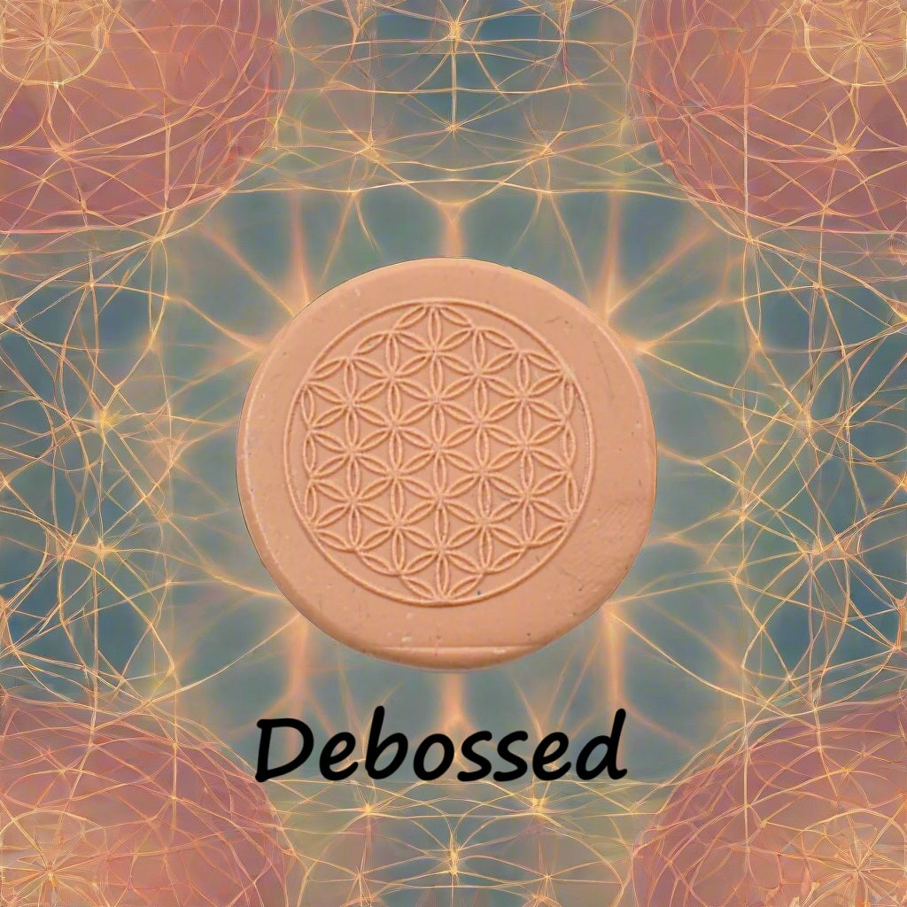 Flower of Life design embossed in silly putty Using an debossed texture mat. This will give you an idea of what it will look like on metal clay or polymer clay