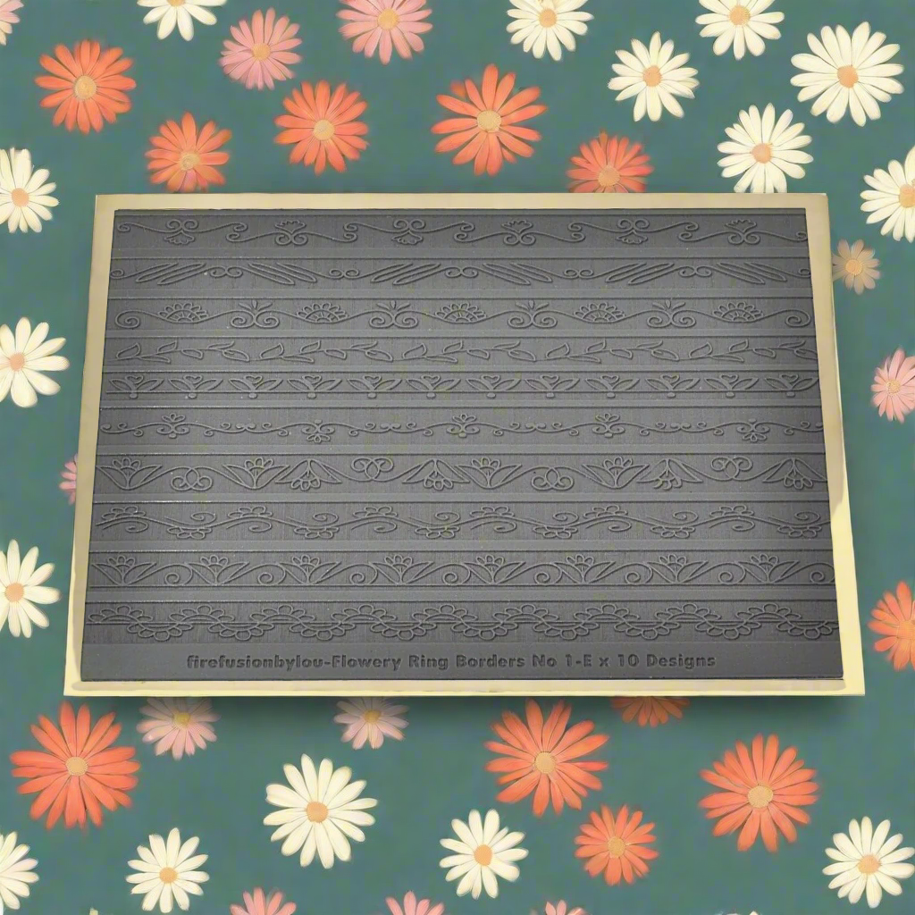 Ten flowery patterns embossed texture mat in grey material. This texture mat will give you a debossed effect on metal clay or polymer clay.