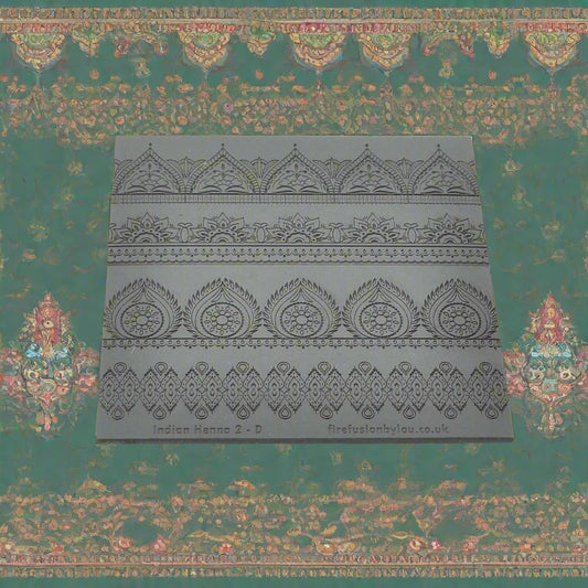 A Indian henna debossed texture mat in grey material. This texture mat will give you an embossed effect on metal clay or polymer clay.