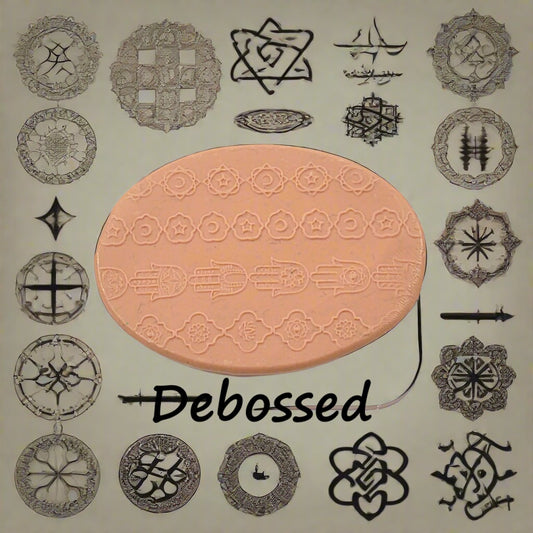 A pattern embossed in silly putty Using a patterned debossed texture mat in grey material. This will give you an idea of what it will look like on metal clay or polymer clay.