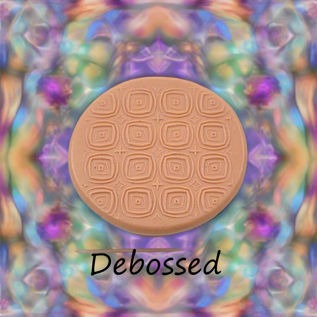 A pattern embossed in silly putty Using a patterned debossed texture mat in grey material. This will give you an idea of what it will look like on metal clay or polymer clay.