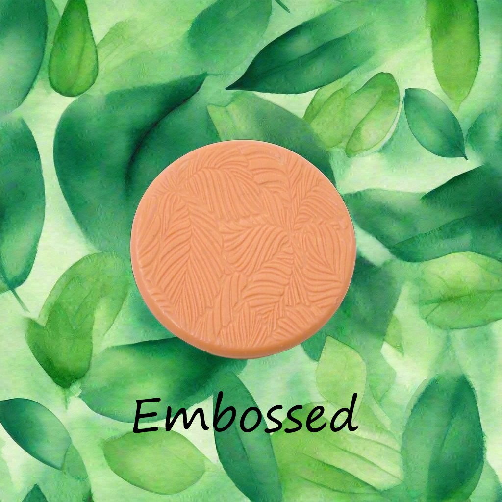 Leaves debossed in silly putty Using a embossed texture mat. This will give you an idea of what it will look like on metal clay or polymer clay