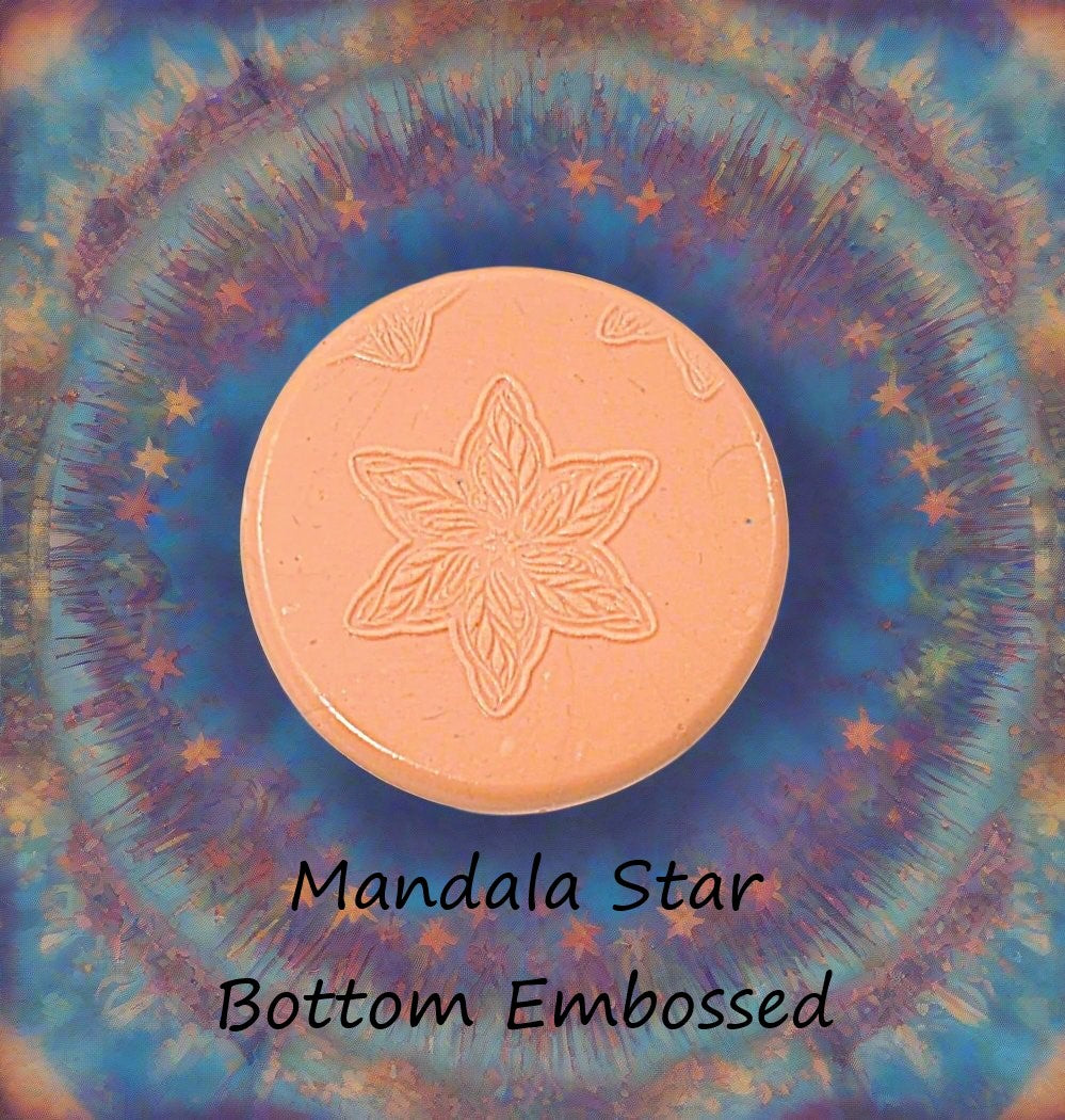 A star flower mandala debossed in silly putty Using a embossed texture mat. This will give you an idea of what it will look like on metal clay or polymer clay.
