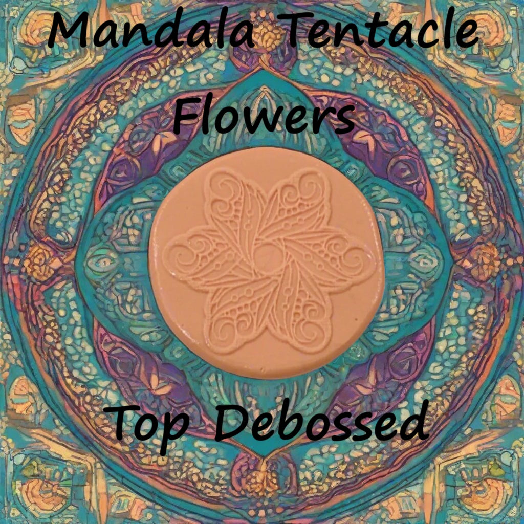 A flower mandala embossed in silly putty Using a debossed texture mat. This will give you an idea of what it will look like on metal clay or polymer clay.