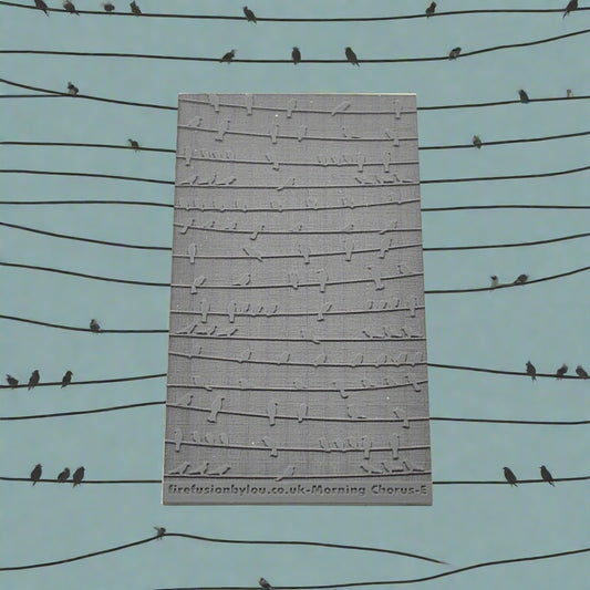 Birds in song pattern embossed texture mat in grey material. This texture mat will give you a debossed effect on metal clay or polymer clay.