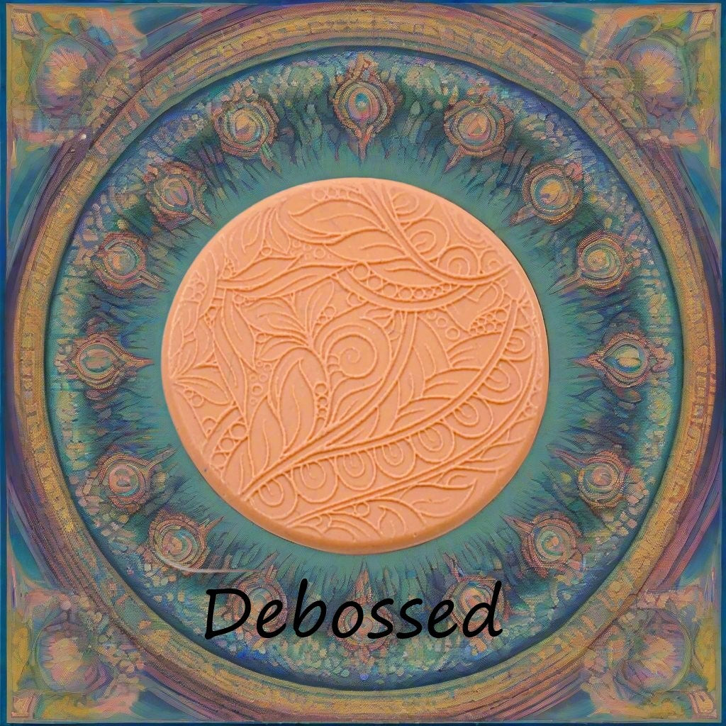 A flowery design embossed in silly putty using a debossed texture mat. This will give you an idea of what it will look like on metal clay or polymer clay.