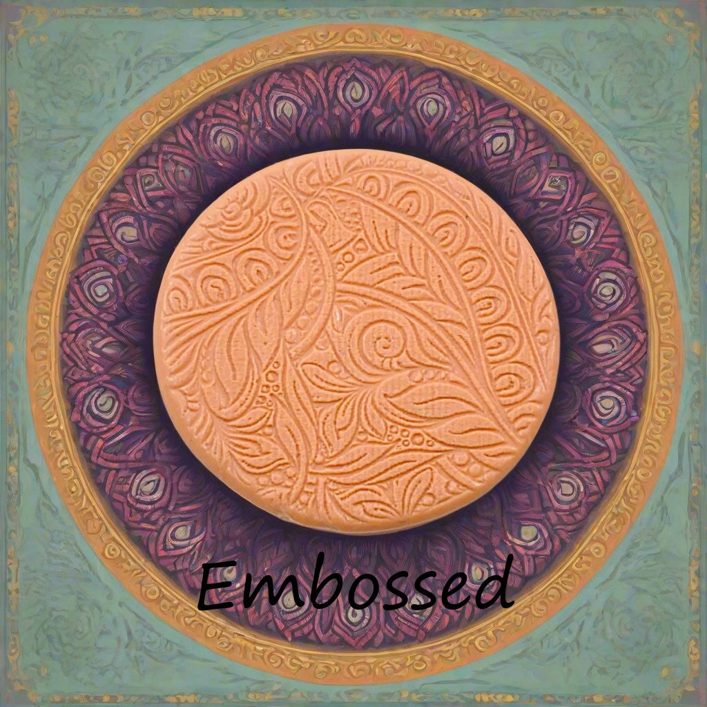A flowery design debossed in silly putty using an embossed texture mat. This will give you an idea of what it will look like on metal clay or polymer clay.