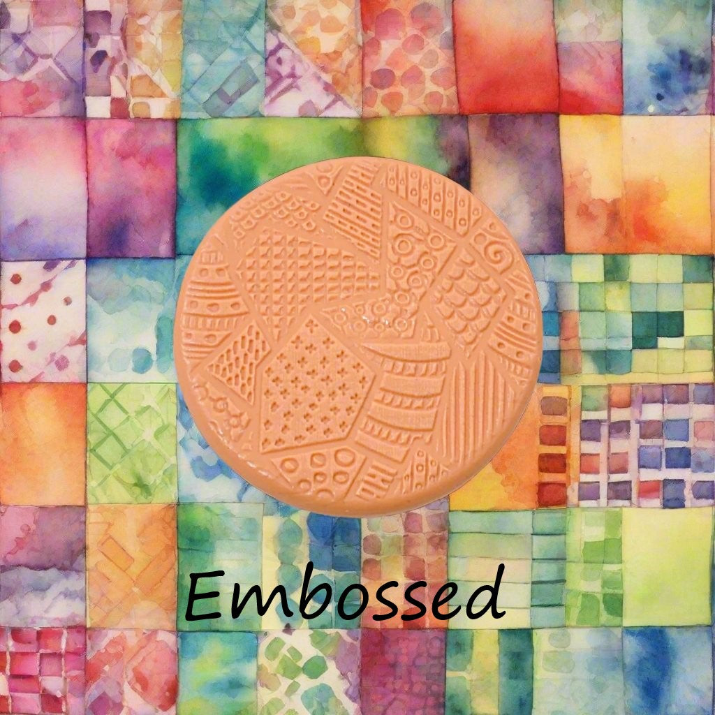 A pattern debossed in silly putty Using a patterned embossed texture mat in grey material. This will give you an idea of what it will look like on metal clay or polymer clay.