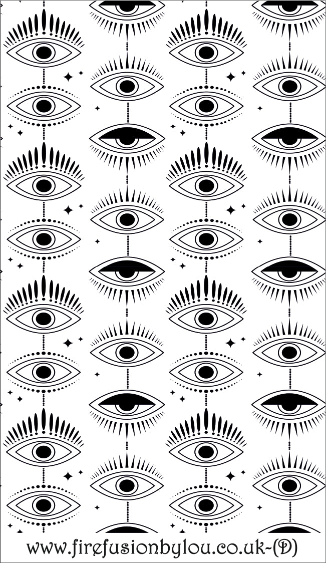 Small symmetrical mystical eye repeat pattern debossed texture mat. This picture shows the texture mat pattern in black and white for use on metal clay or polymer clay.
