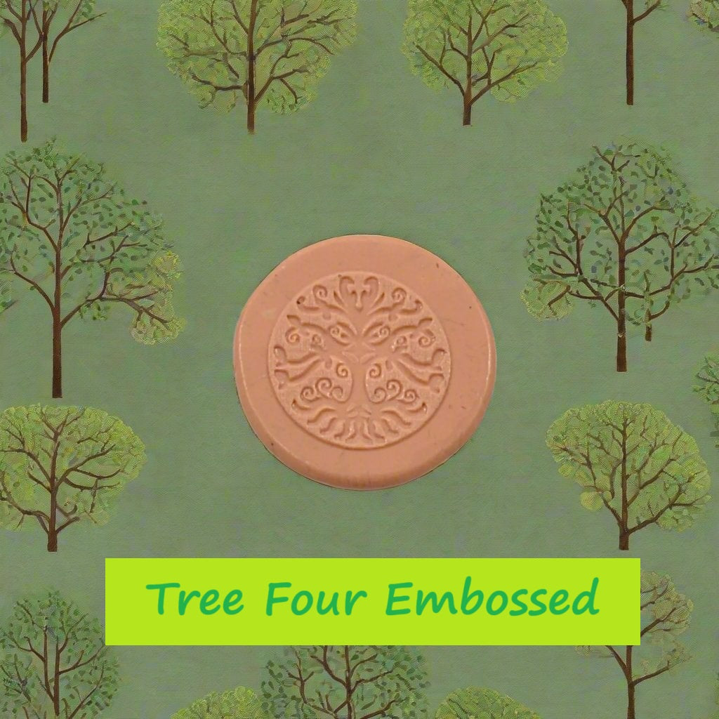 A pattern debossed in silly putty Using a patterned embossed texture mat in grey material. This will give you an idea of what it will look like on metal clay or polymer clay.