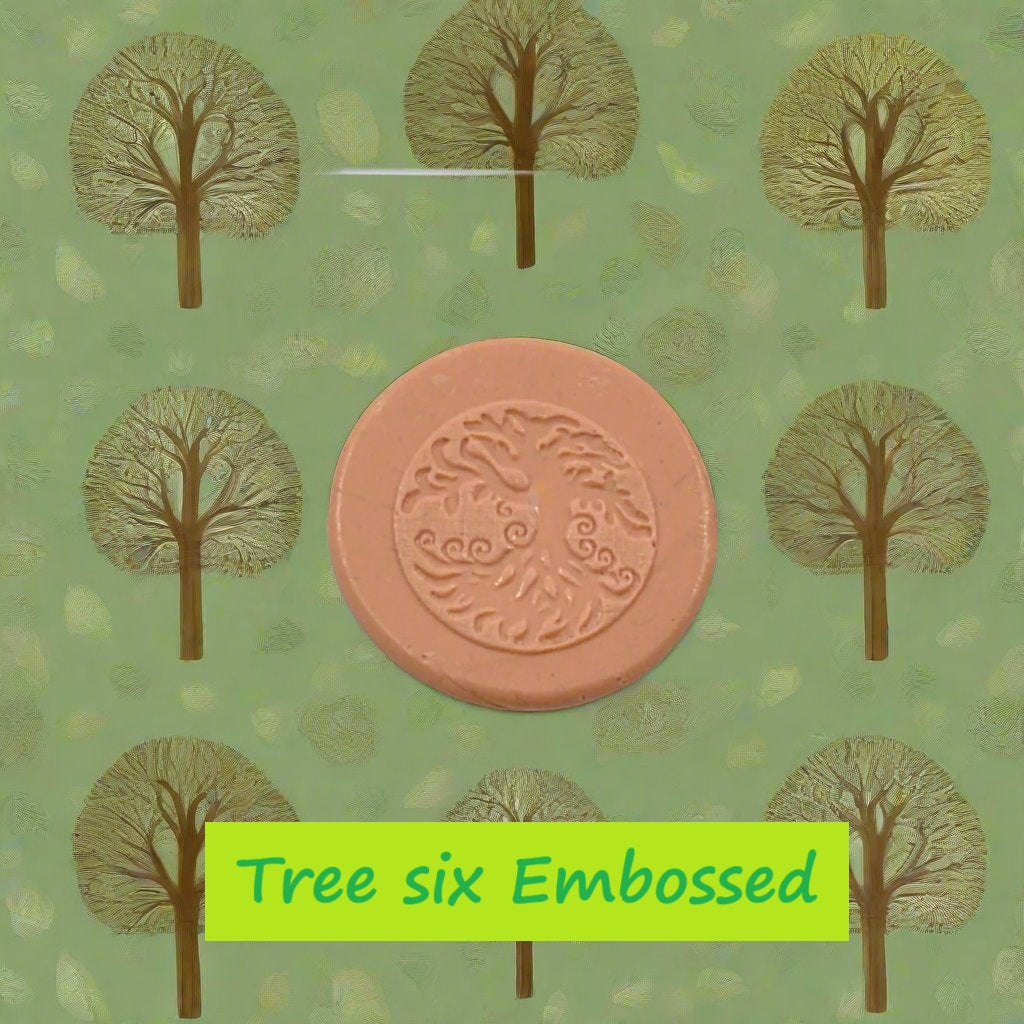 A pattern debossed in silly putty Using a patterned embossed texture mat in grey material. This will give you an idea of what it will look like on metal clay or polymer clay.