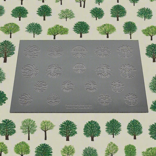 A 145 x 100 mm texture mat with seven tree designs and two sizes. use to make an impression on metal clay and polymer clay.