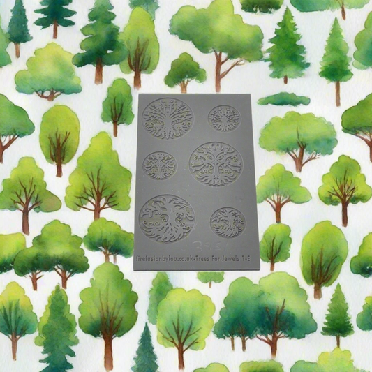 An embossed tree texture mat with tree designs and two sizes. use to make an impression on metal clay and polymer clay.