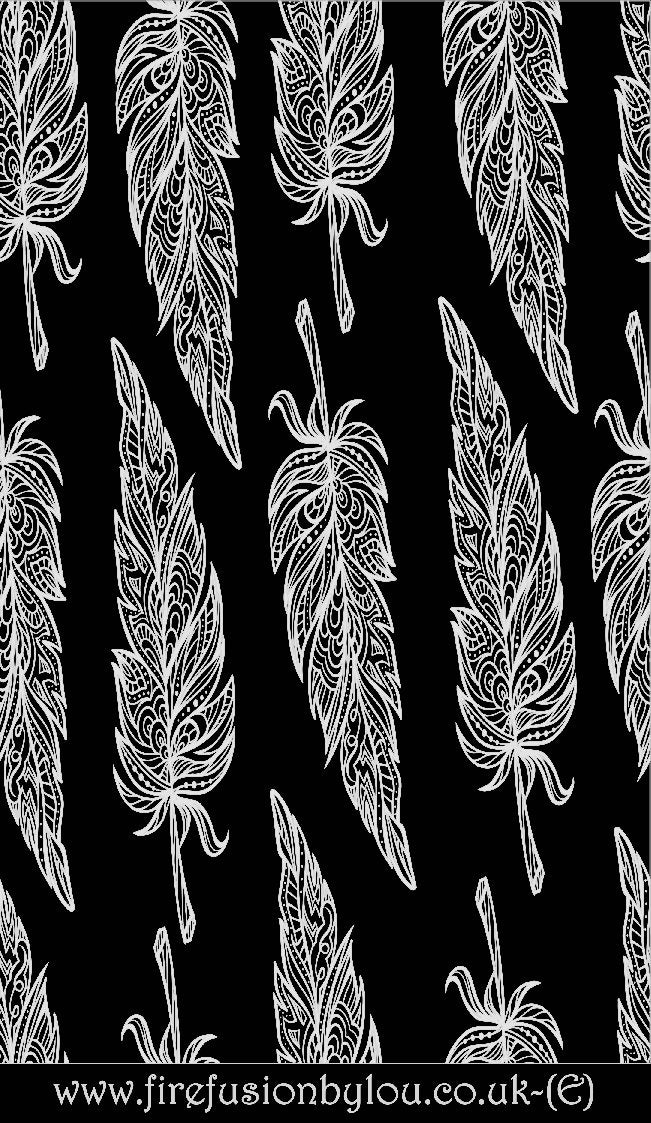 An intricate tribal feather pattern embossed texture mat in grey material. This picture shows the texture mat pattern in black and white for use on metal clay or polymer clay.