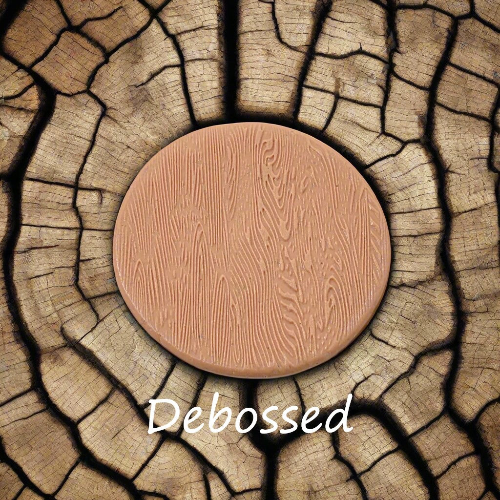 Tree bark designs embossed in silly putty Using a debossed texture mat. This will give you an idea of what it will look like on metal clay or polymer clay.
