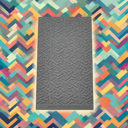 A pattern debossed texture mat in grey material. The texture mat pattern will give a embossed effect on metal clay or polymer clay.