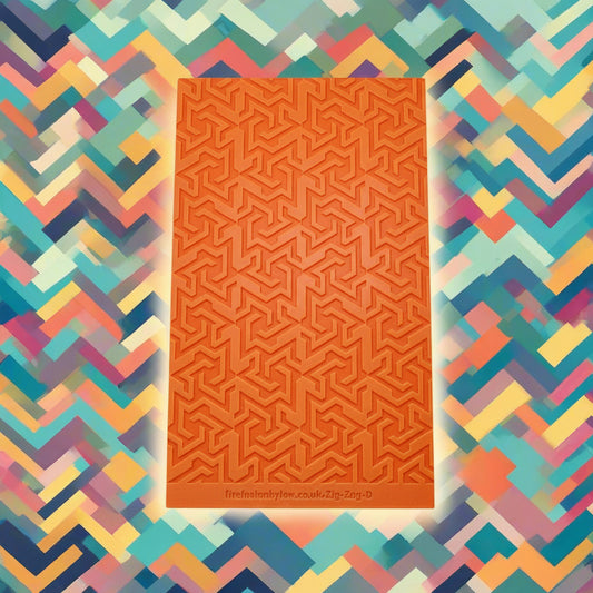 A pattern debossed texture mat in grey material. The texture mat pattern will give a embossed effect on metal clay or polymer clay.