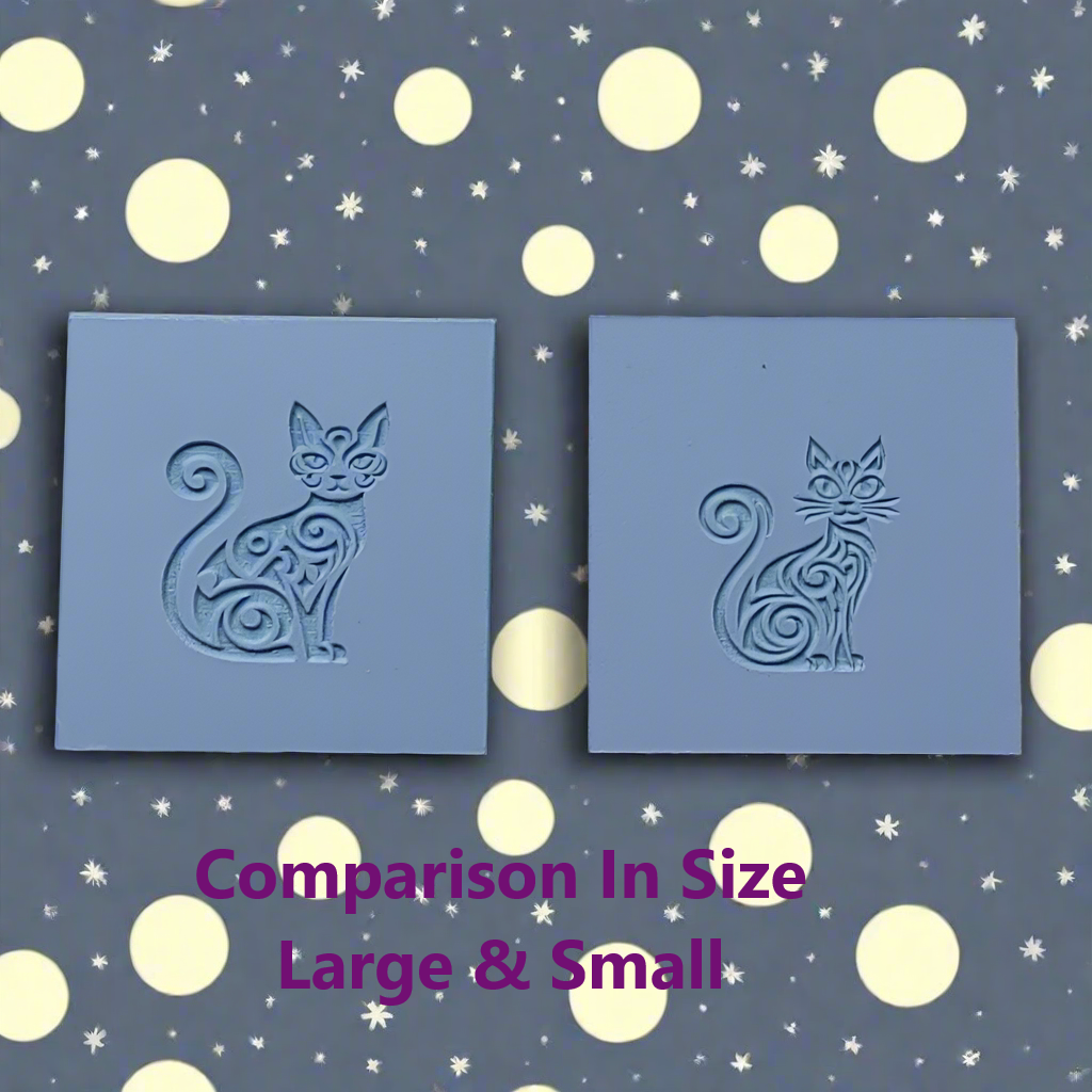 Two blue square stamps with cat designs on a patterned background