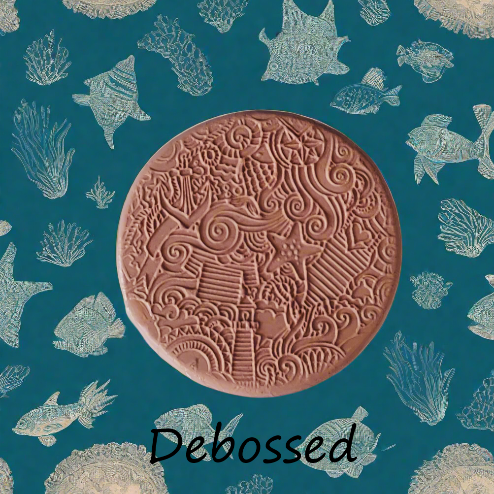 Ocean embossed in silly putty Using a debossed texture mat. This will give you an idea of what it will look like on metal clay or polymer clay