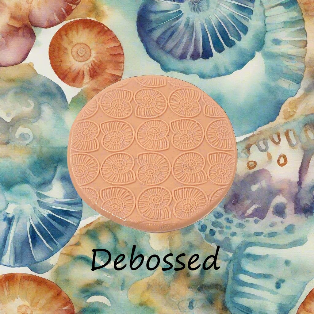 Ammonite embossed in silly putty Using a debossed texture mat. This will give you an idea of what it will look like on metal clay or polymer clay