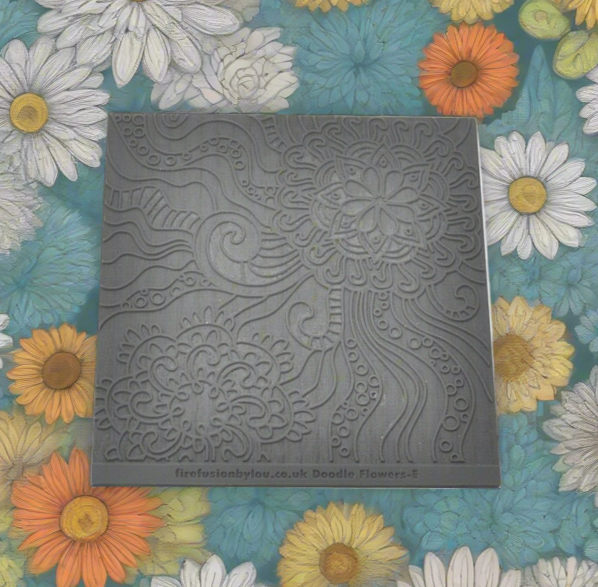 A pattern embossed texture mat in grey material. This texture mat will give you a debossed effect on metal clay or polymer clay.