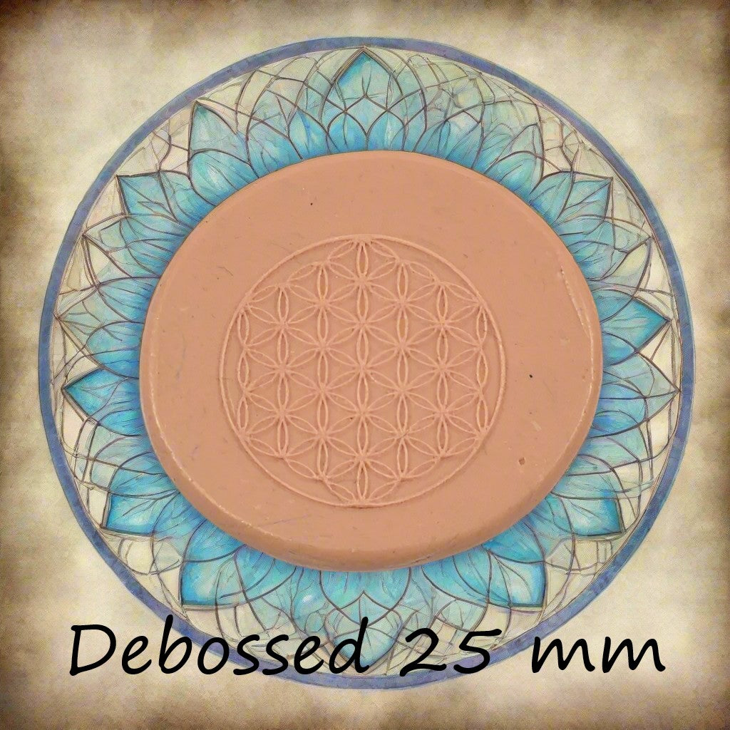 25 mm Flower of Life design embossed in silly putty Using a debossed texture mat. This will give you an idea of what it will look like on metal clay or polymer clay