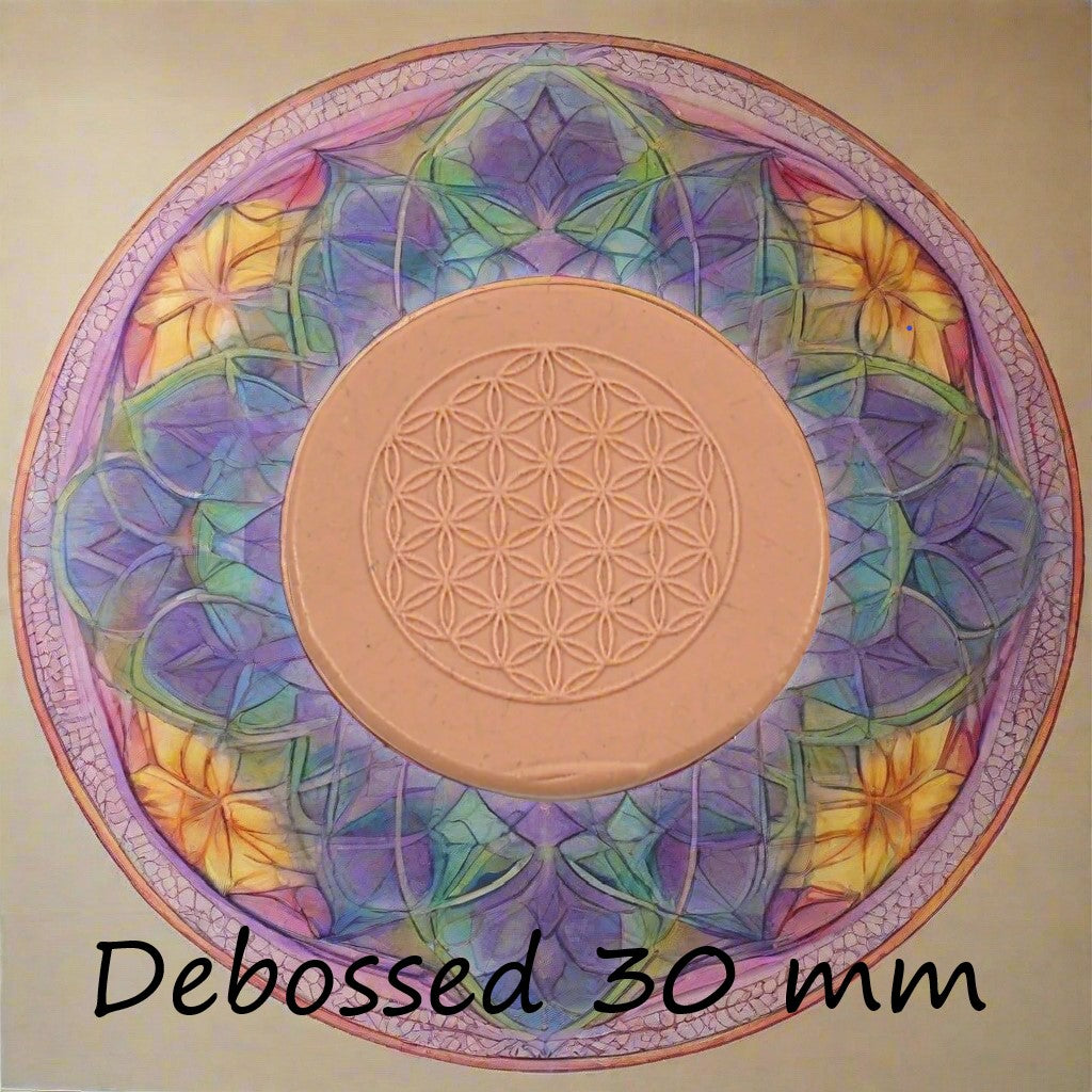 30 mm Flower of Life design embossed in silly putty Using a debossed texture mat. This will give you an idea of what it will look like on metal clay or polymer clay