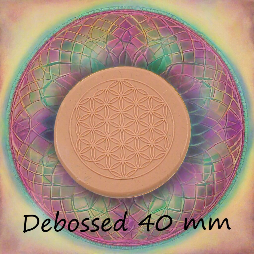 40 mm Flower of Life design embossed in silly putty Using a debossed texture mat. This will give you an idea of what it will look like on metal clay or polymer clay