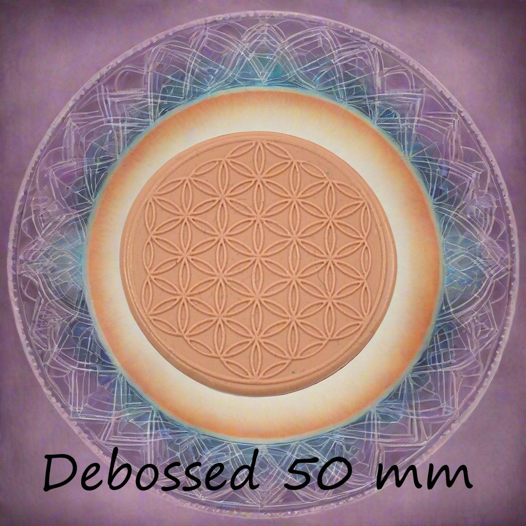 50 mm Flower of Life design embossed in silly putty Using a debossed texture mat. This will give you an idea of what it will look like on metal clay or polymer clay