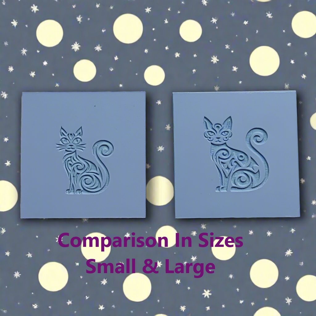 Two blue square stamps with cat designs on a dark background with light circles and stars.