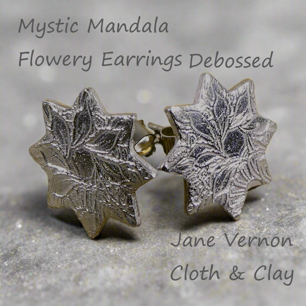 Silver 999 stud earrings embossed with mystic mandala two texture mat design.