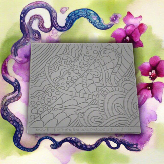 A pattern debossed texture mat in grey material. This texture mat will give you an embossed effect on metal clay or polymer clay.
